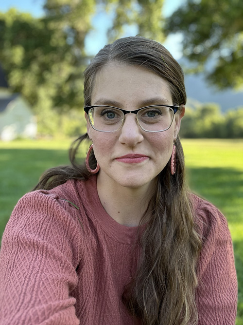 A picture of April, The Moxie Witch, a tarot reader and mama witch