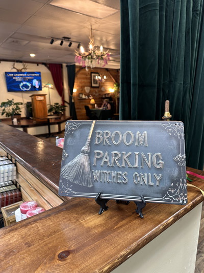 broom-parking-conjuring-tree funny witchy sign at the conjuring tree
