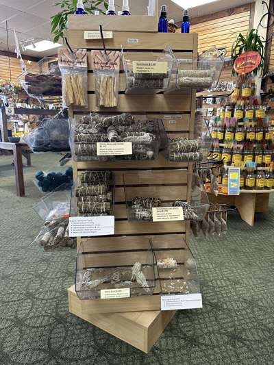 smoke cleansing and smudging wands at the conjuring tree